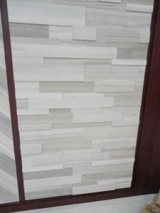 Panel de revestimiento de pared pulido azulejo de mármol grano de madera blanco