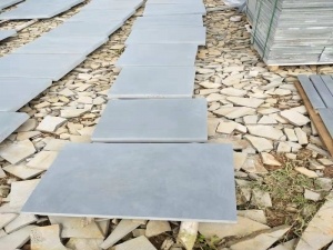 Revestimiento de pared exterior de basalto gris Hainan Baldosa de piso eficiente