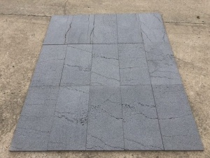 Hainan basalto negro piedra de lava azulejos en bruto